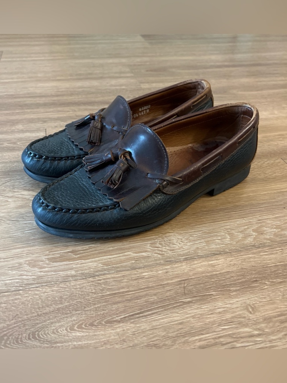 Allen Edmonds Black and Brown Tassel Kiltie Loafers
